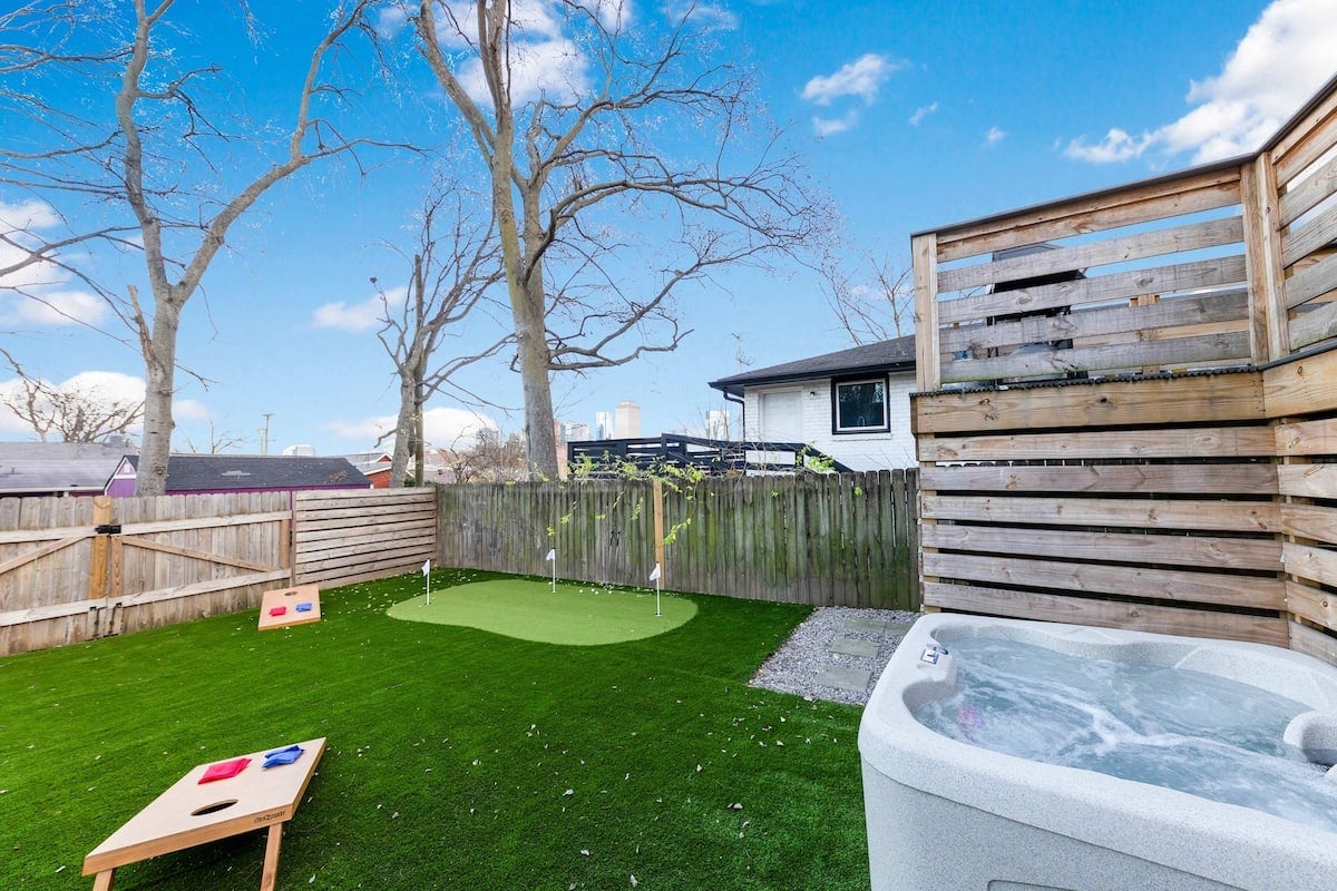 Relaxation Awaits in This Peaceful Outdoor Escape with a Hot Tub