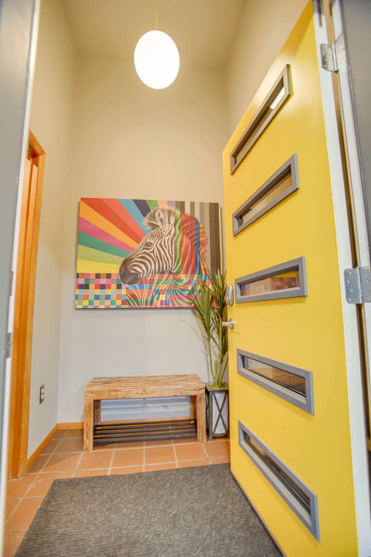 Who doesn't Love a Fun Zebra Print in their entryway :)