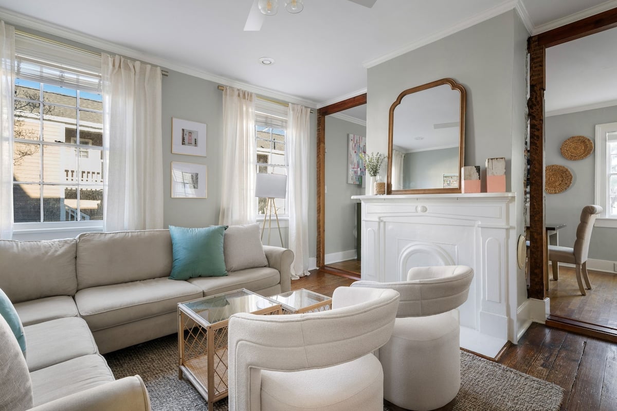 Backyard calm and balcony light at a home built for slow days in Charleston, SC