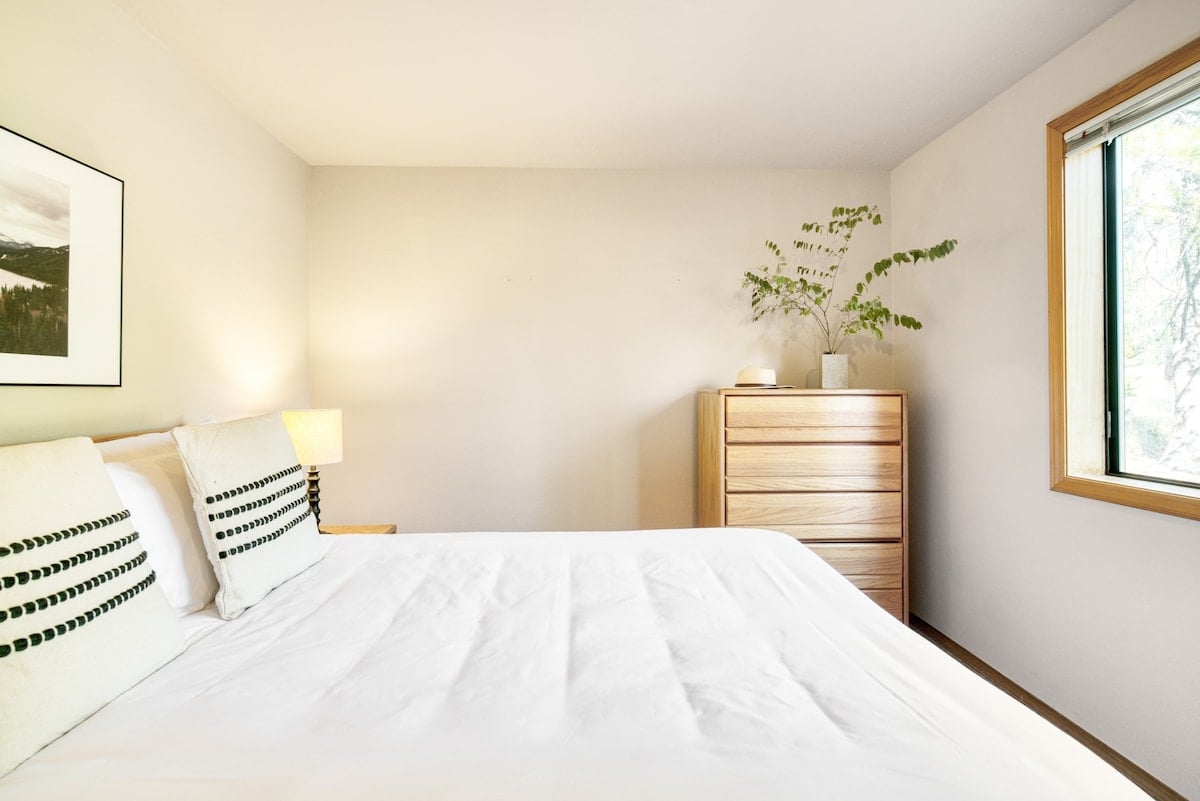 Bedroom 2 features a queen bed.