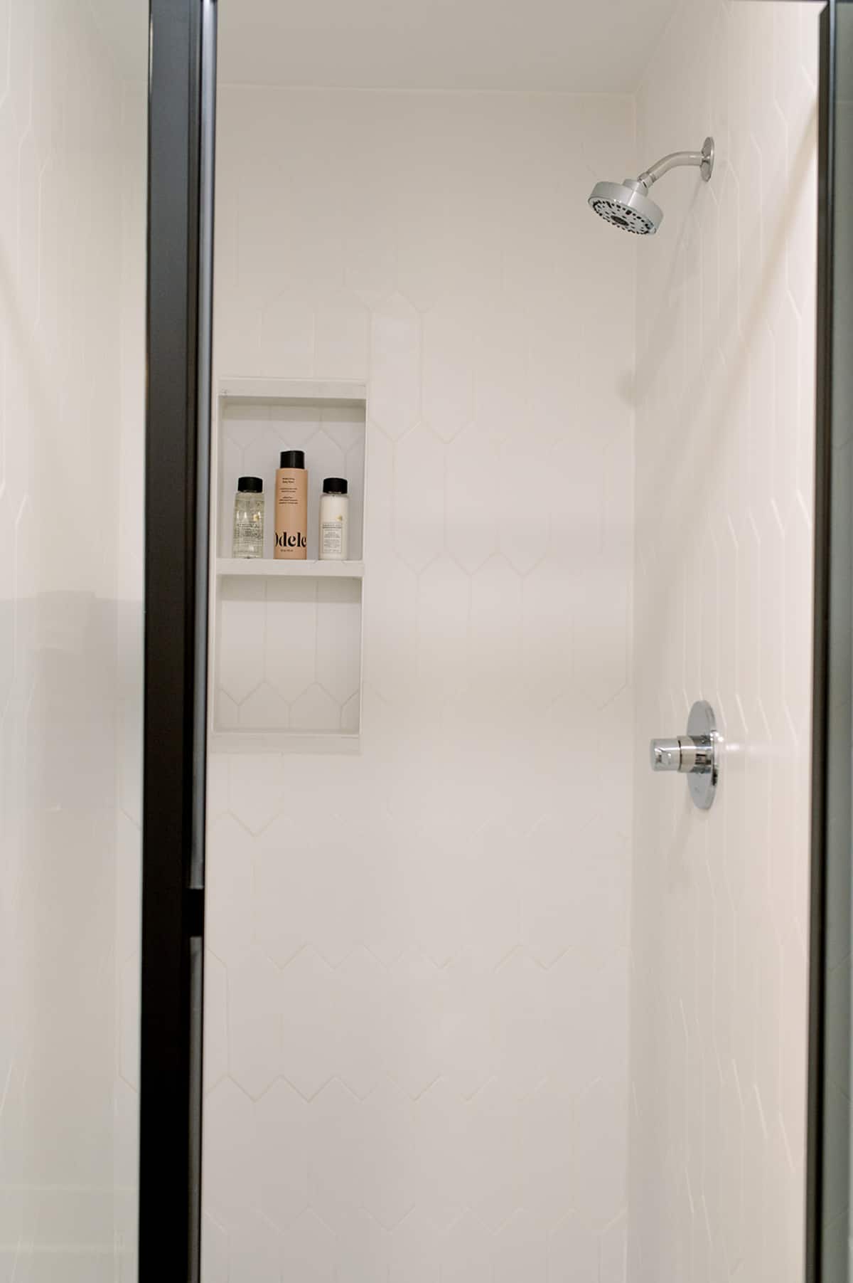 Tile shower in primary bathroom