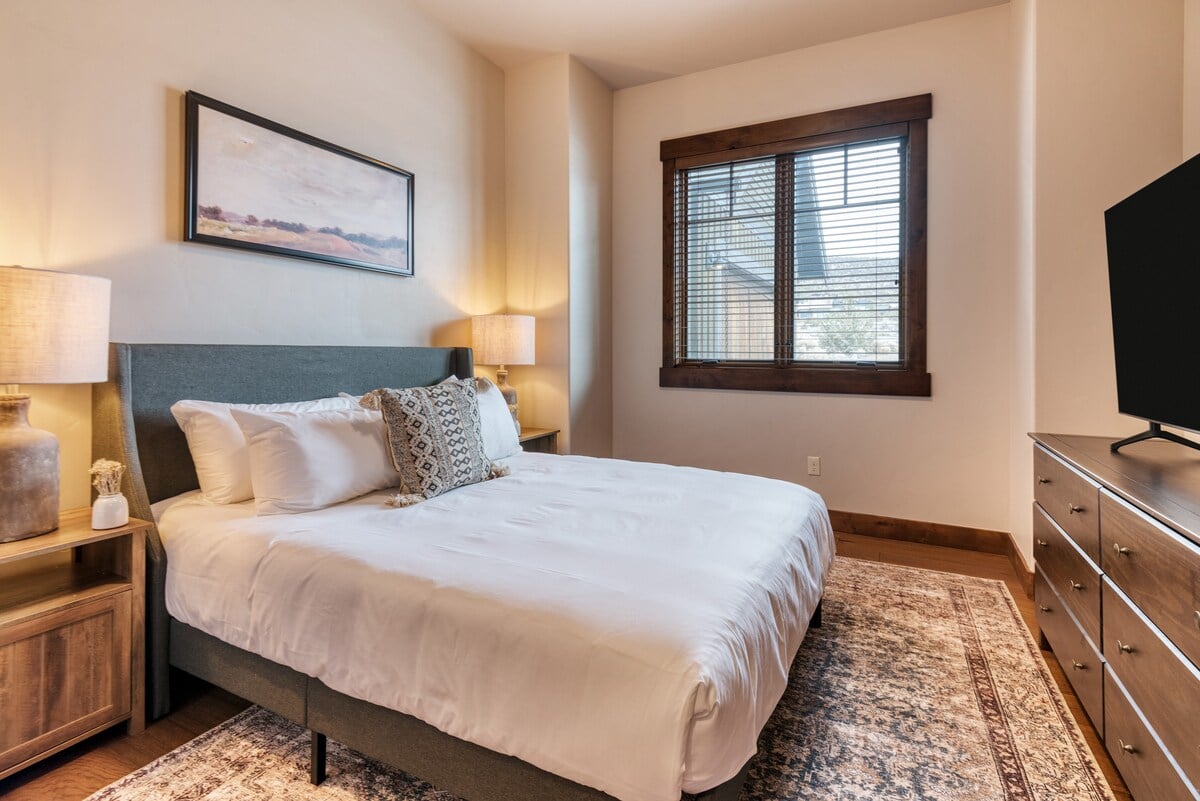 Bedroom 4 features a queen bed.