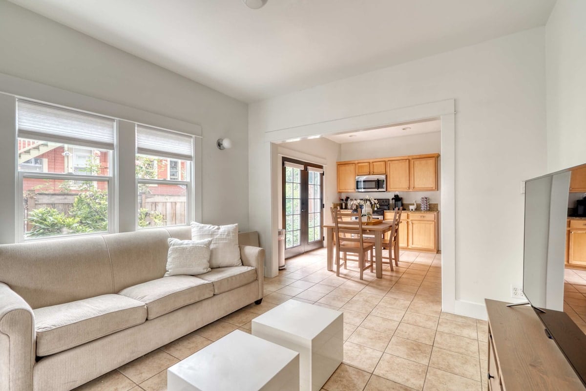 CAPTION:
Discover "Property" in Portland, a luxurious haven featuring a modern open-plan design. This elegant space exudes a warm and inviting atmosphere with its soothing neutral palette of whites and beiges. Large windows flood the interior with natural light, highlighting the simplistic yet sophisticated decor. Ideal for travelers seeking comfort and style, the property seamlessly blends urban living with serene relaxation, making it a perfect retreat in the bustling city.