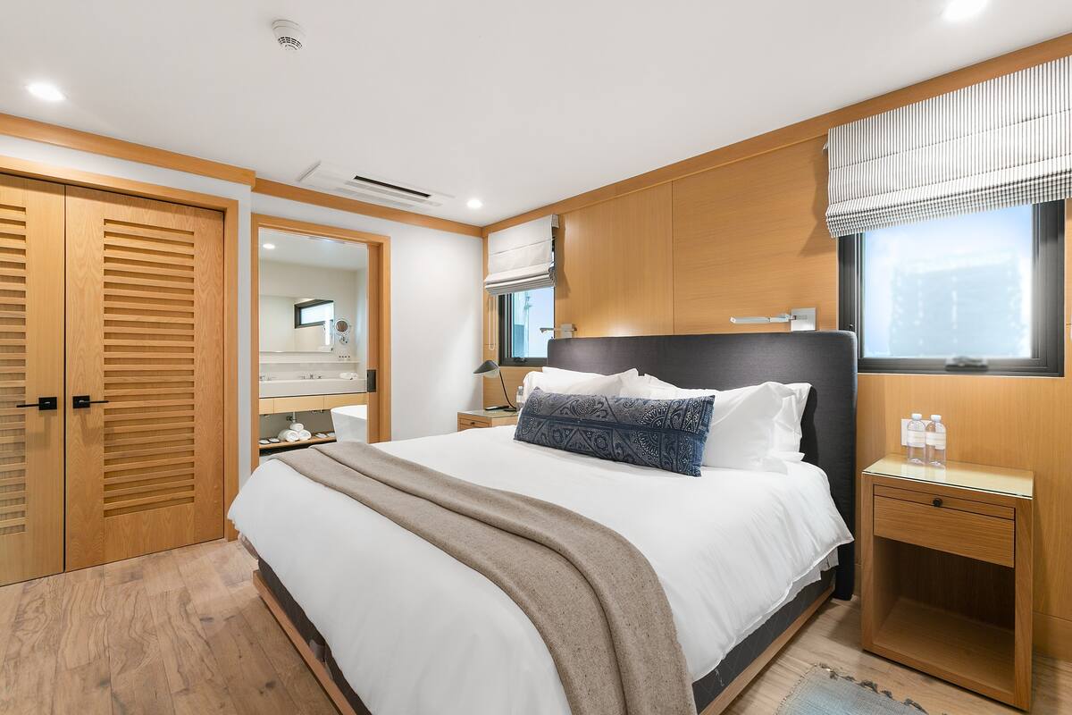 King sized fully outfitted with high quality linens and down comforter for a dreamy sleep