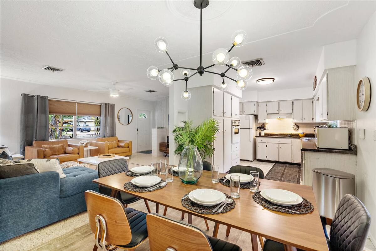 Fun sputnik chandelier lights up the dining space.