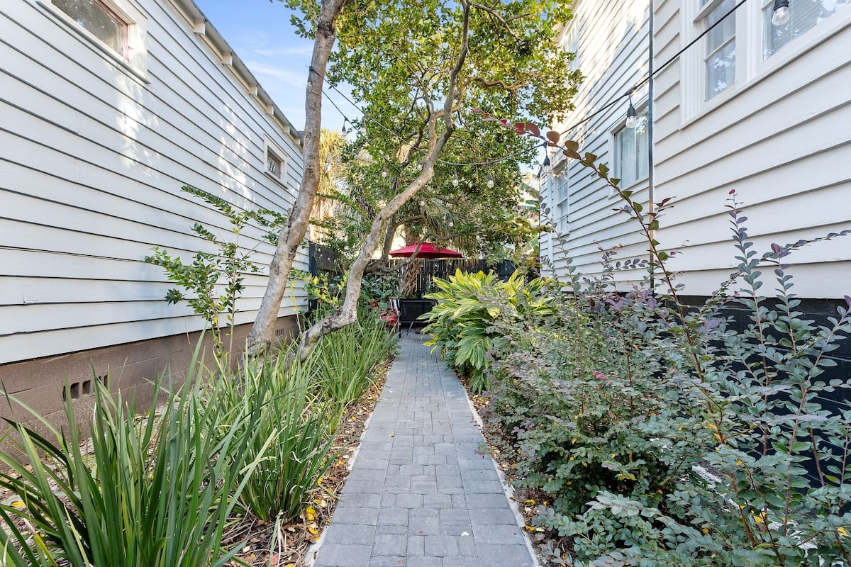 Behind the old walls of Casa Bella, a suite steeped in another century in Charleston, SC