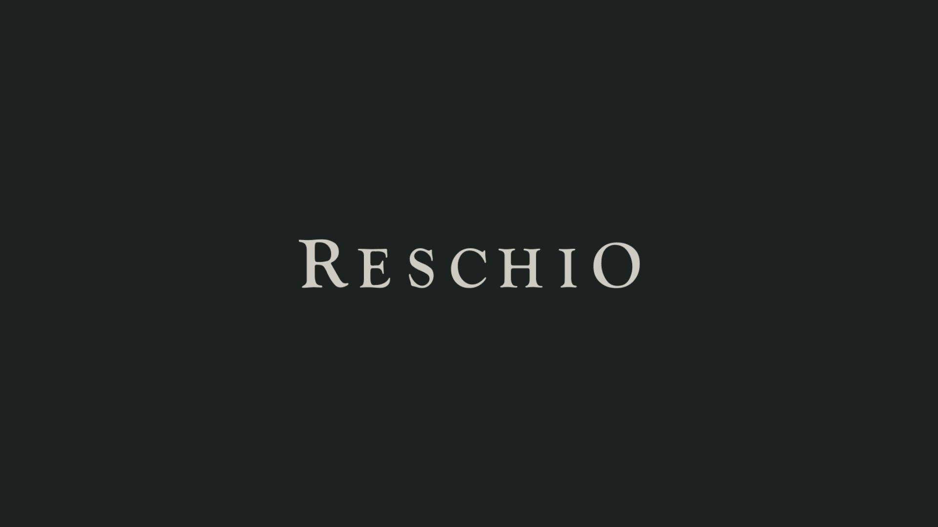 Elegant typography against charcoal darkness hints at the refined sophistication awaiting guests at this storied Umbrian estate, where understated luxury defines every detail.