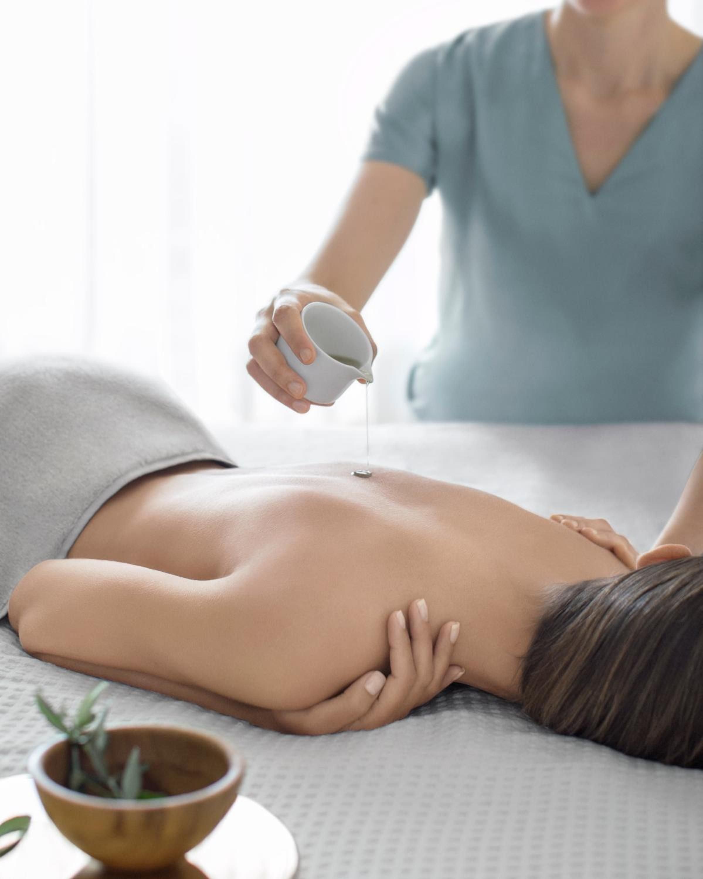 Warm oil cascades onto sun-kissed skin as skilled therapists perform signature treatments, transforming the spa into a sanctuary of Mediterranean wellness rituals.