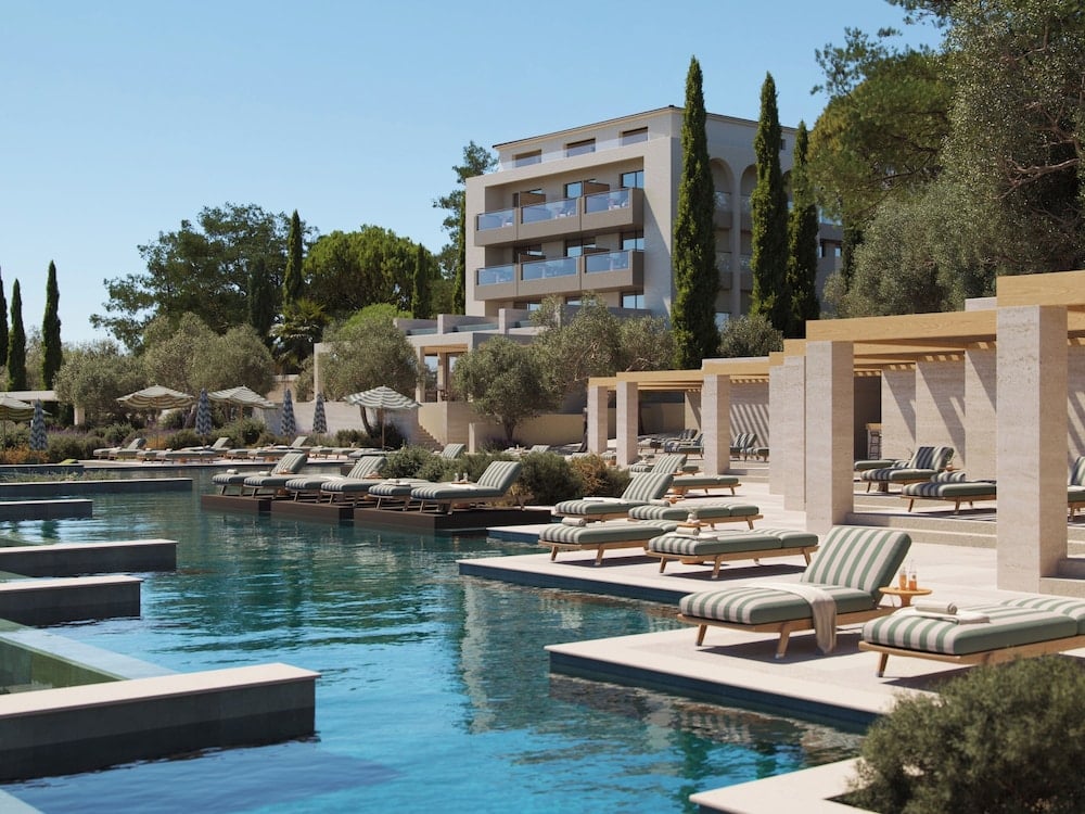 Where the Ionian coast unfolds in sunlit simplicity at Avali in Corfu, Ionian Islands