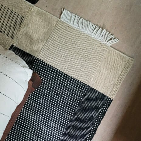 Handwoven textiles in natural fibers create intimate gathering spaces, where neutral tones and artisanal craftsmanship reflect the property's commitment to authentic, tactile luxury.
