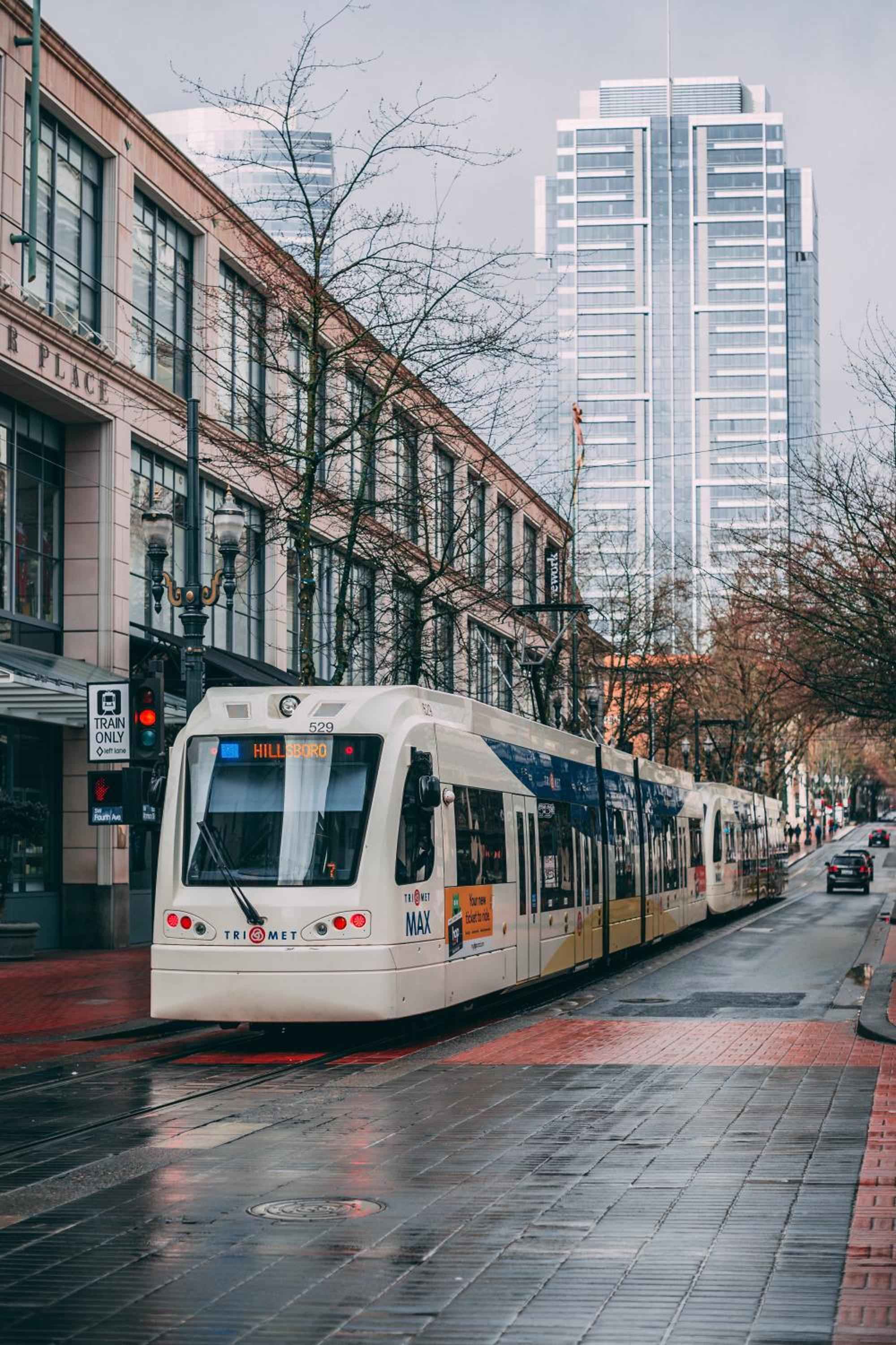 Portland's MAX light rail glides through downtown's brick-lined streets, connecting Jupiter NEXT guests to the city's vibrant neighborhoods with effortless urban transit.