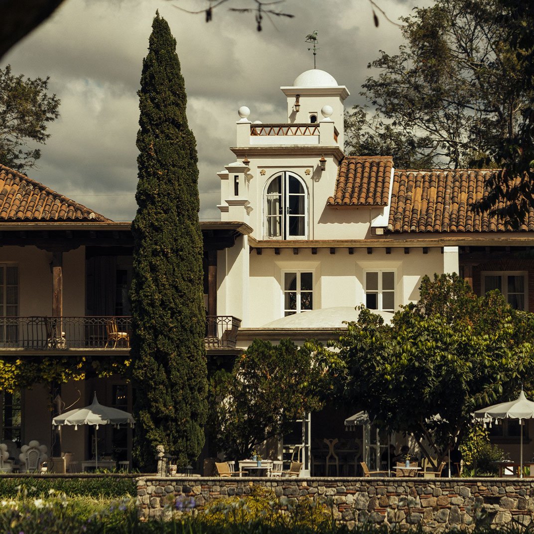 Mediterranean elegance unfolds beneath terracotta tiles and towering cypress, where intimate terraces and stone walls frame moments of quiet luxury.