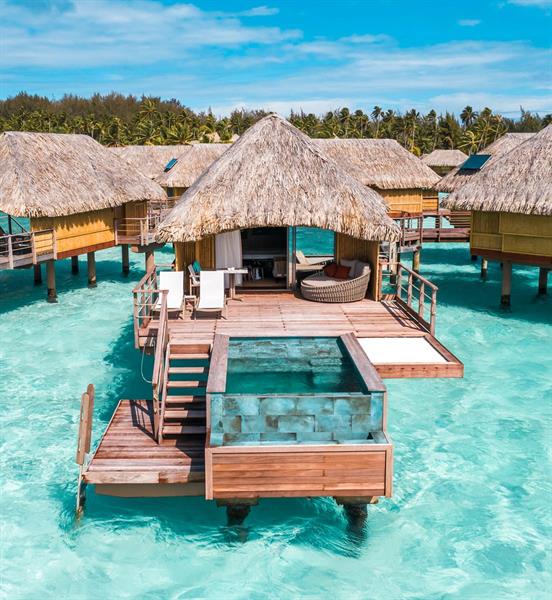 Where the lagoon meets the sky on Bora Bora's eastern shore in Bora-Bora, Îles Sous-le-Vent