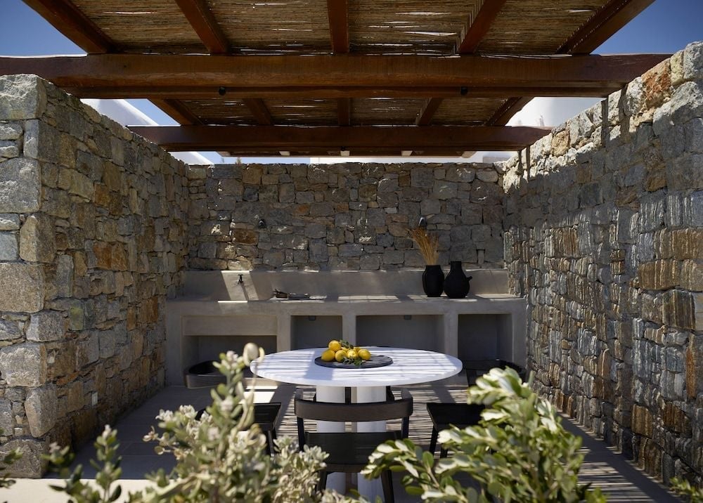 Where whitewashed architecture meets the wide Mykonian horizon in Mykonos, GR