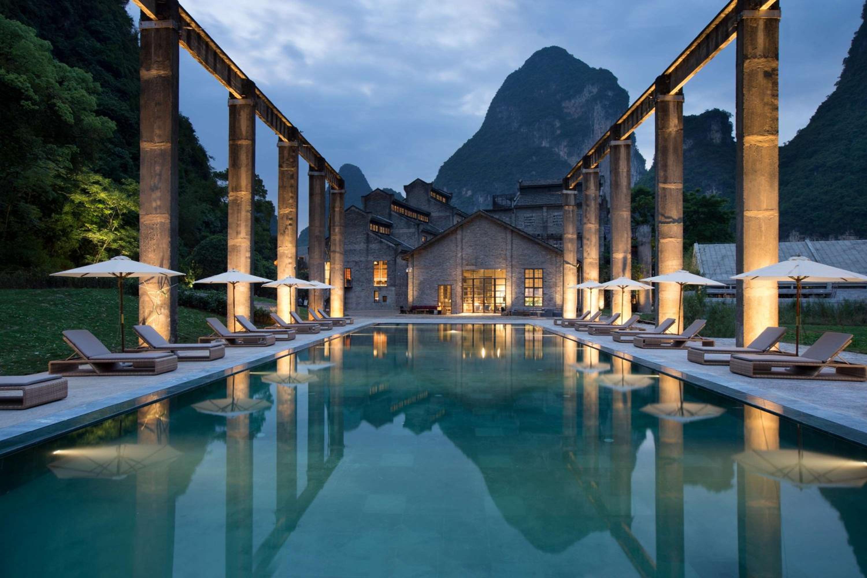 Where limestone towers meet industrial heritage on the Li River in Yangshuo, cn