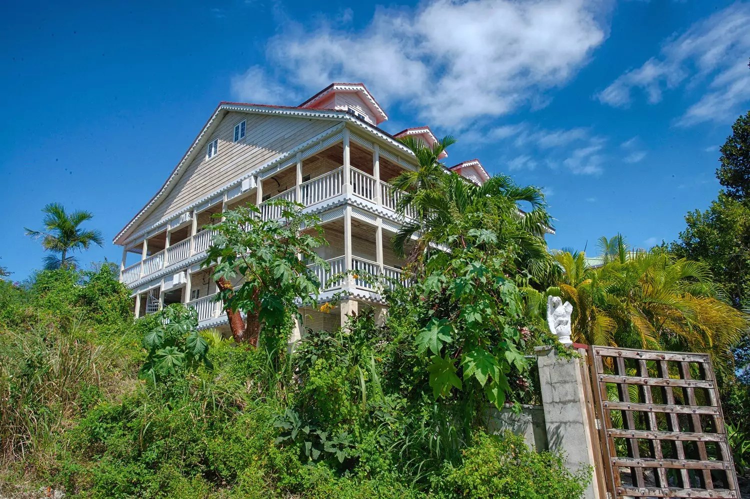 Where the garden gate opens to Barbados and the sea beyond in Nassau, New Providence