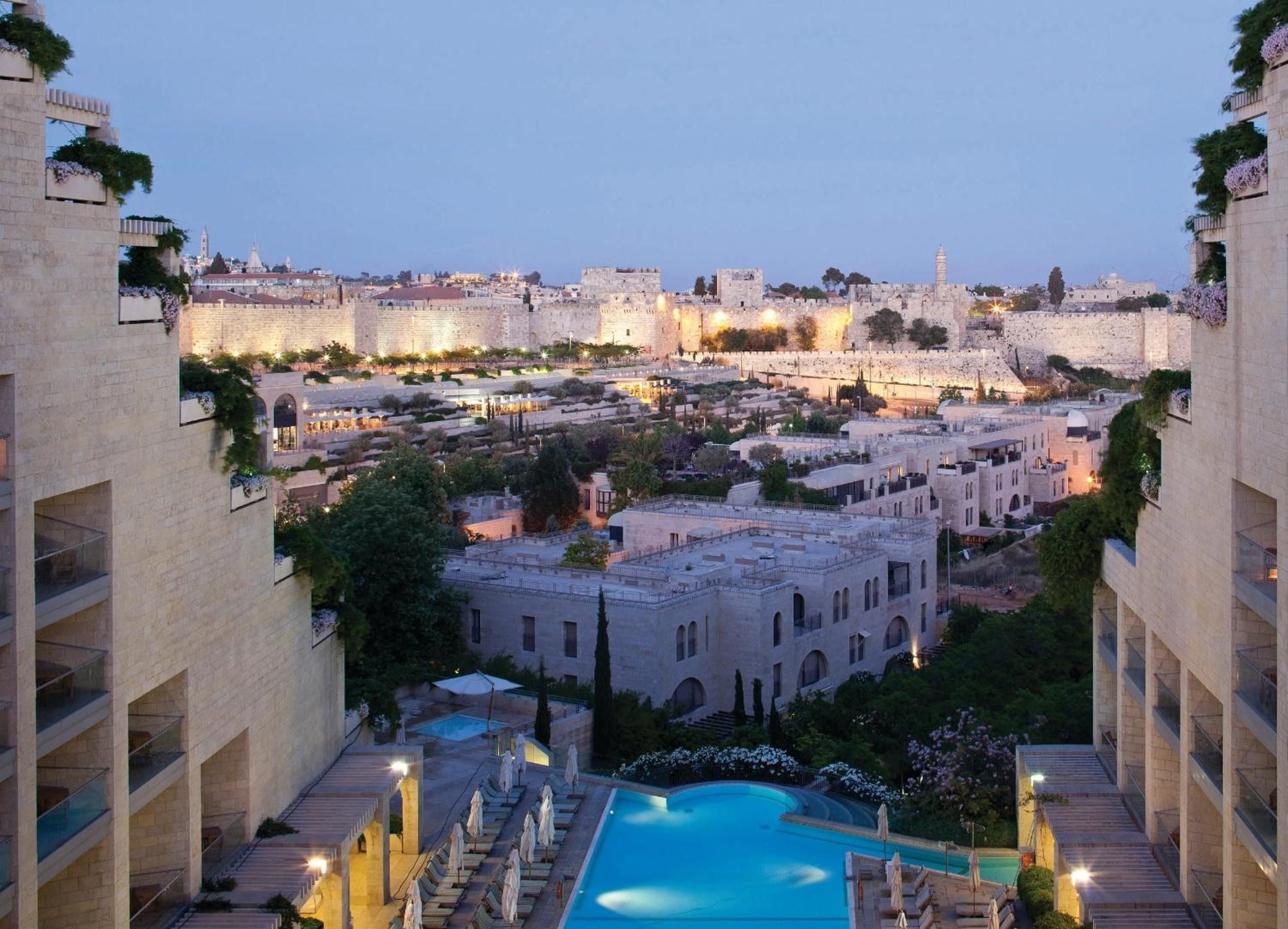 Where Jerusalem's ancient stone meets the light of a modern grand hotel in Jerusalem, Jerusalem