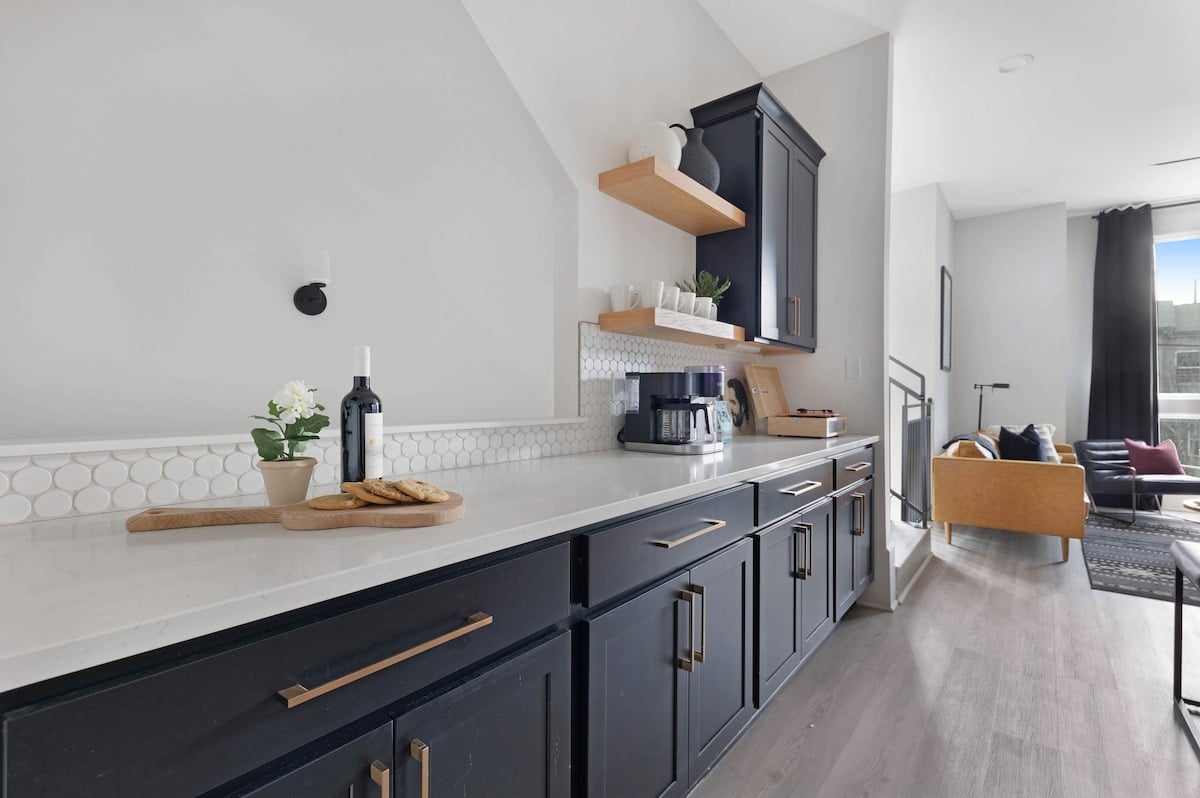 Fully Stocked Kitchen with Modern Appliances and Ample Storage
