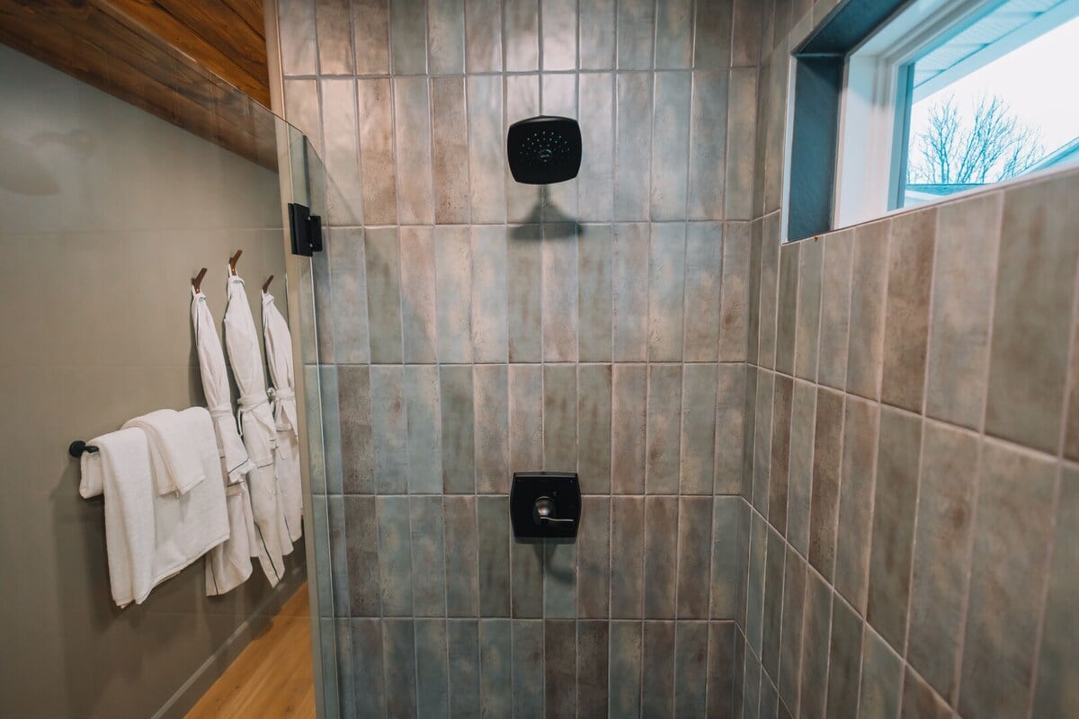 Full Bath 1 is located through the hallway on the lower level.