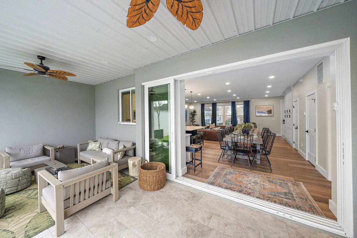 The transition from indoors to outdoors is incredible with a set of accordion patio doors! Open them up to enjoy a bit of that tropical FL weather inside!