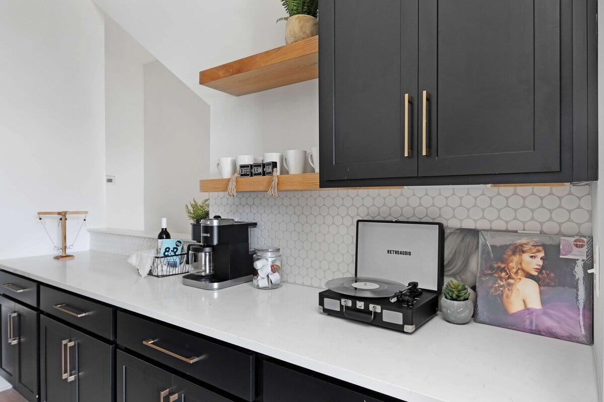Modern bar area with coffee station and record player