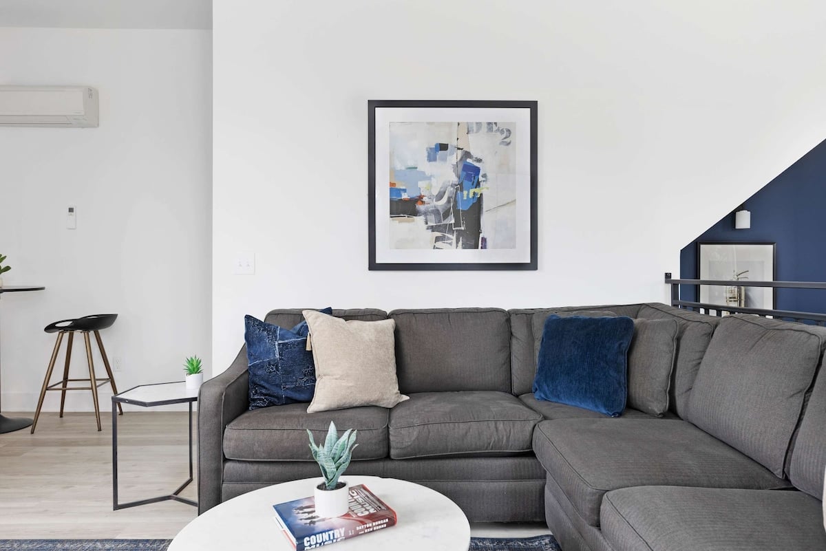 Spacious living room with plush sectional—perfect for relaxing