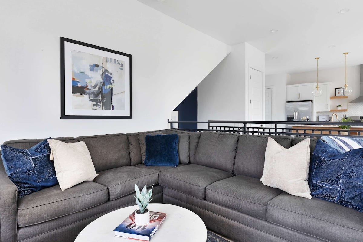 Relax on the spacious sectional with stylish, modern décor.