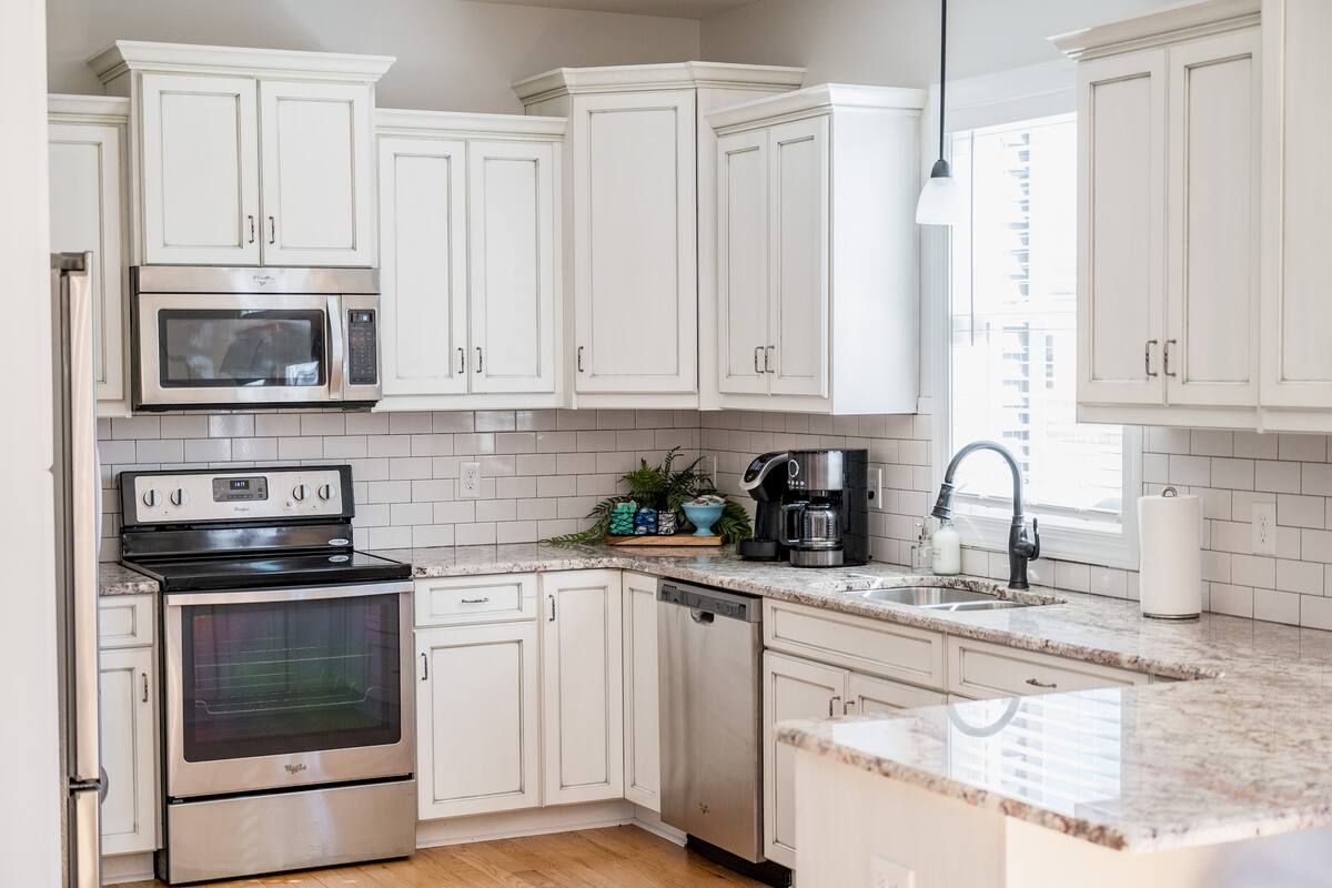 Fully stocked kitchen with all the essentials for cooking meals... Pots, pans, dishware, glasses, etc.