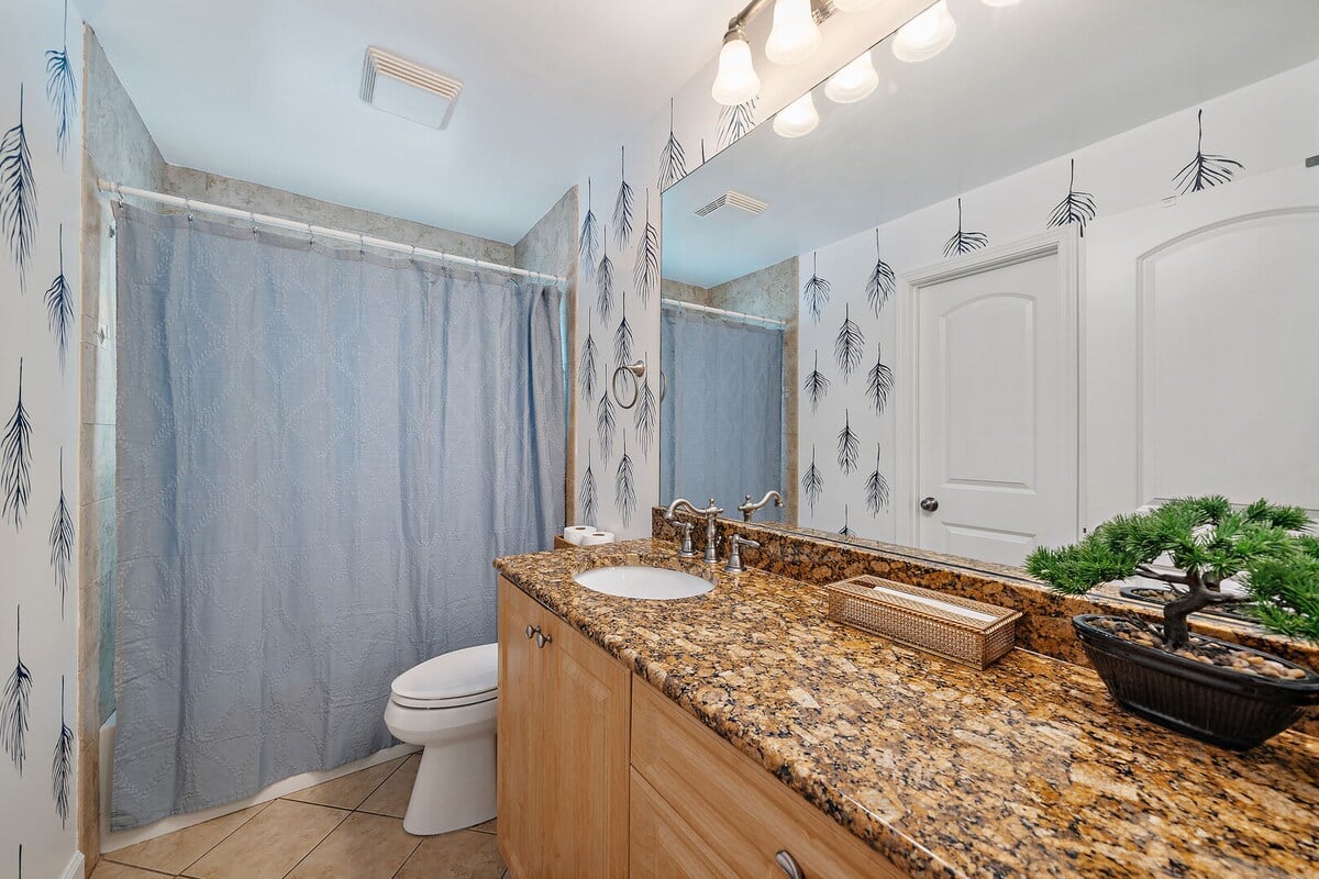 Full bath 2 located in the hallway.