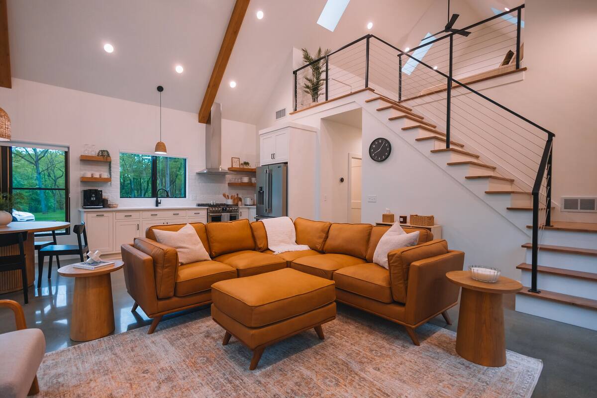 The staircase leads to the upper loft area.