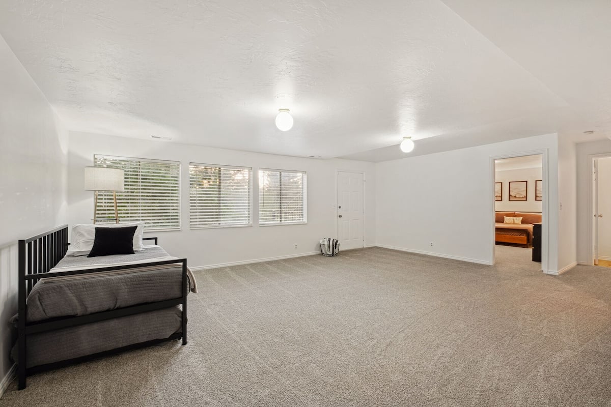 An additional Twin Bed and Trundle Bed is located in the basement common area.