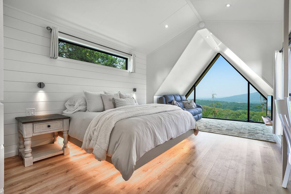 Check out your private lit up floating King Size Bed.