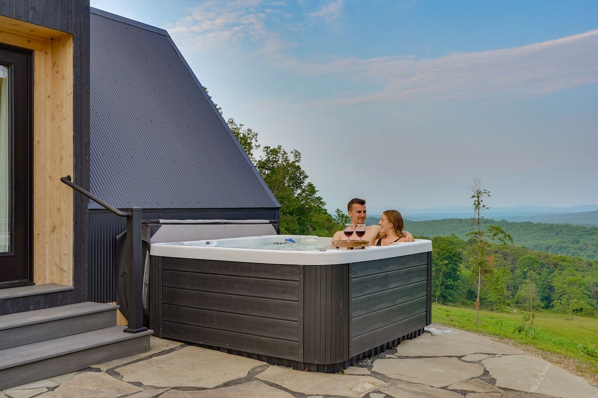 Soak your stress away with the bubbling hot tub and stunning valley views!