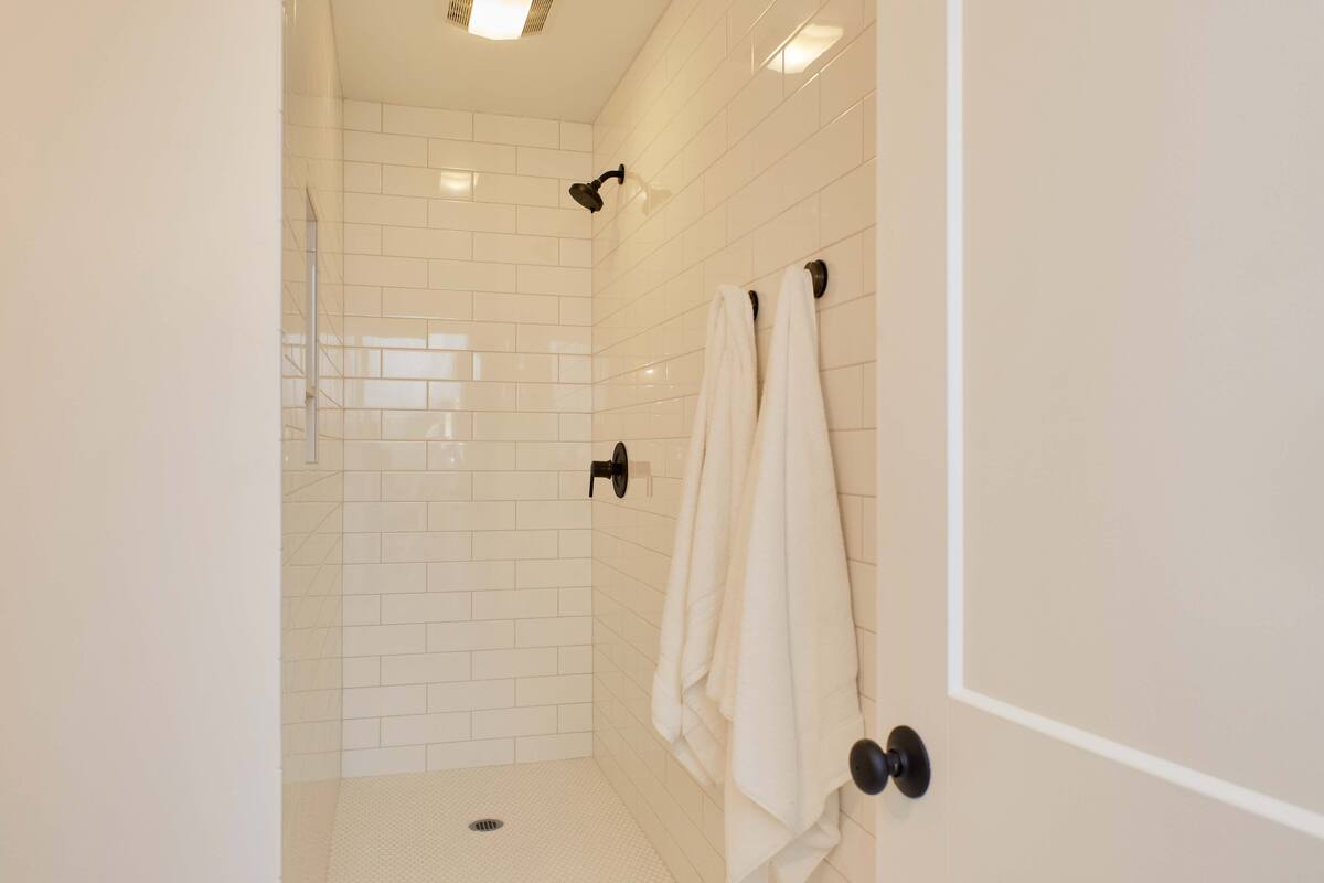 State of the art bathroom.. Included are towels, t.p., body wash, shampoo, conditioner.