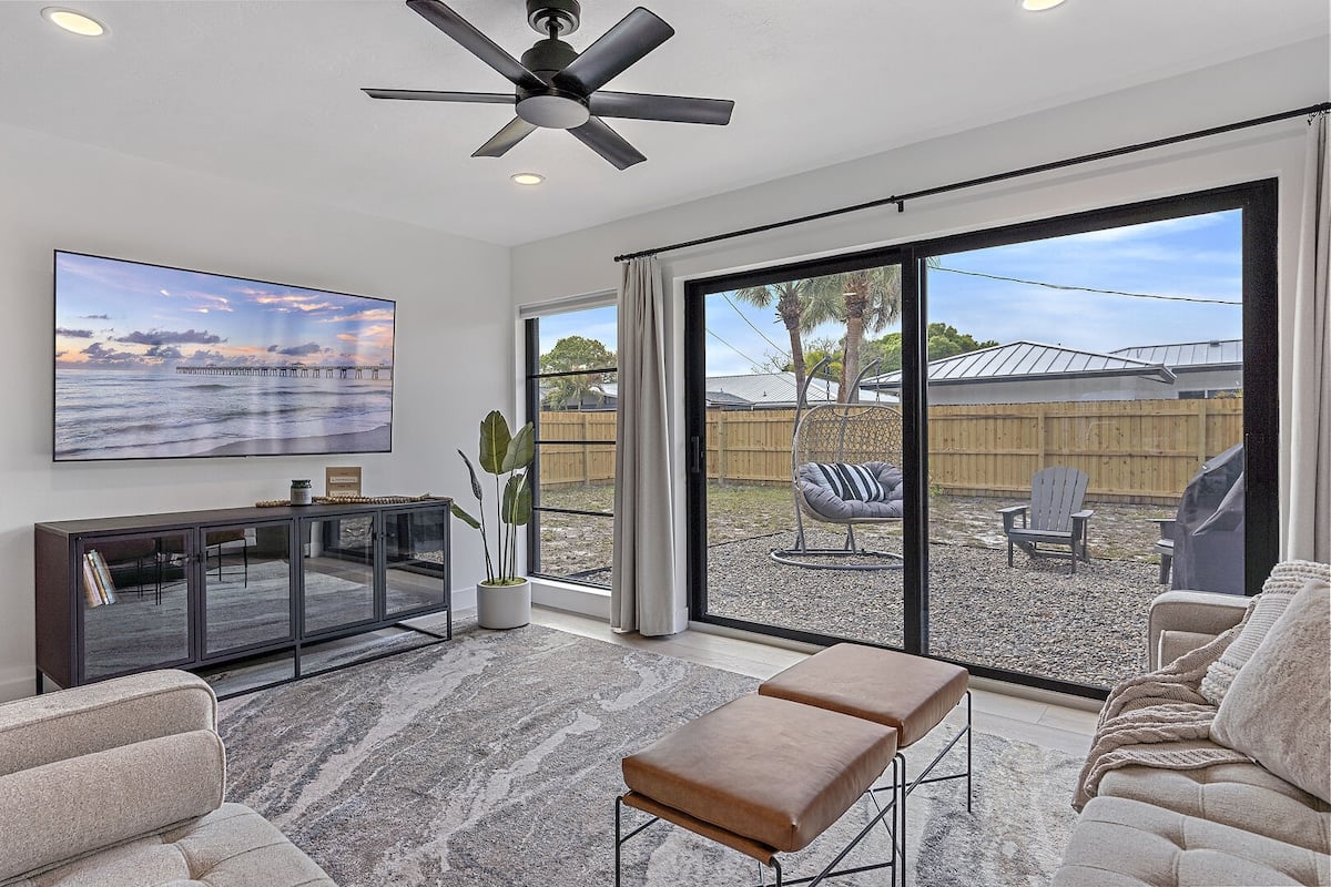 Cozy up on the couch and catch up on your latest shows on the smart TV!

**The backyard has been updated with more amenities since this image was taken.