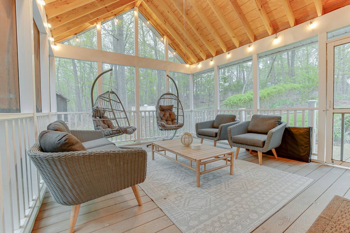 Step outside the dining room sliding door into the screened in porch.