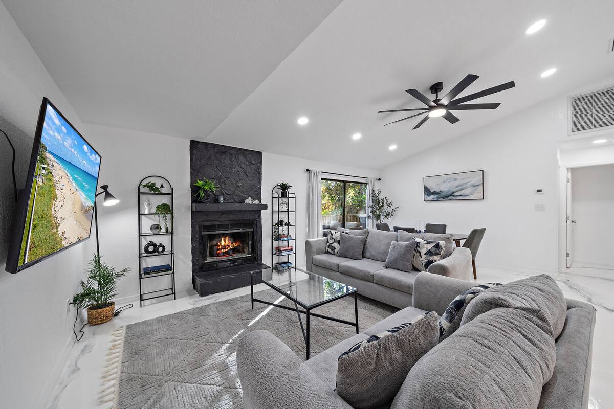 The sliding glass doors allow for so much light and easy access to the back deck.