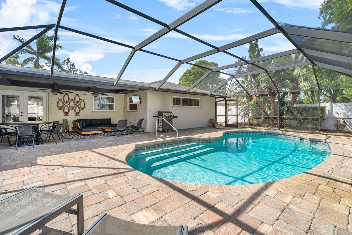 Have yourself a cookout in the backyard space with the provided grill and dining space.