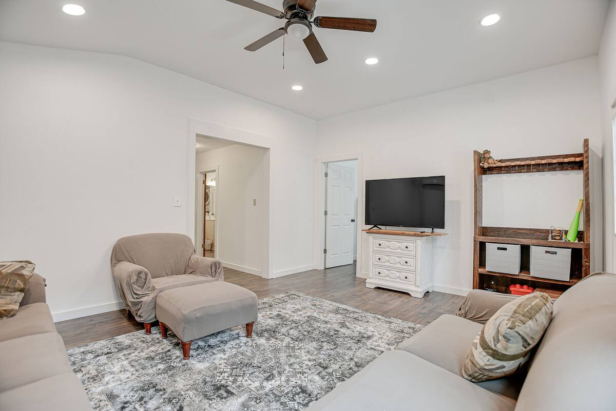 Living Room 1 with comfy sofas and 55" Smart TV!