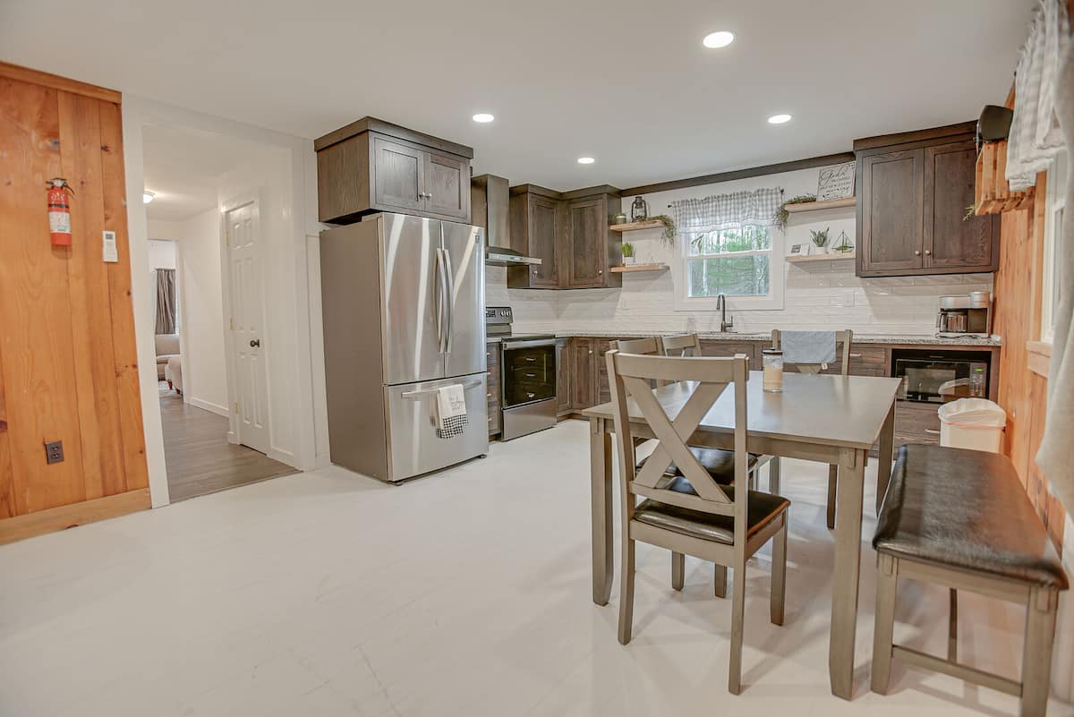 Full Kitchen & Dining table down the hall from Living Room 1!