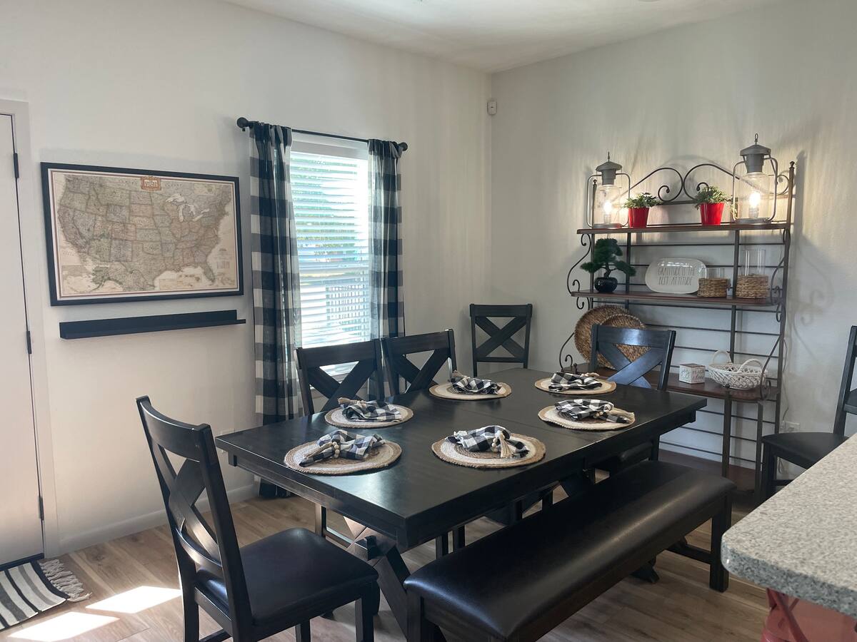 Large dining table that expands to seat 10 people.