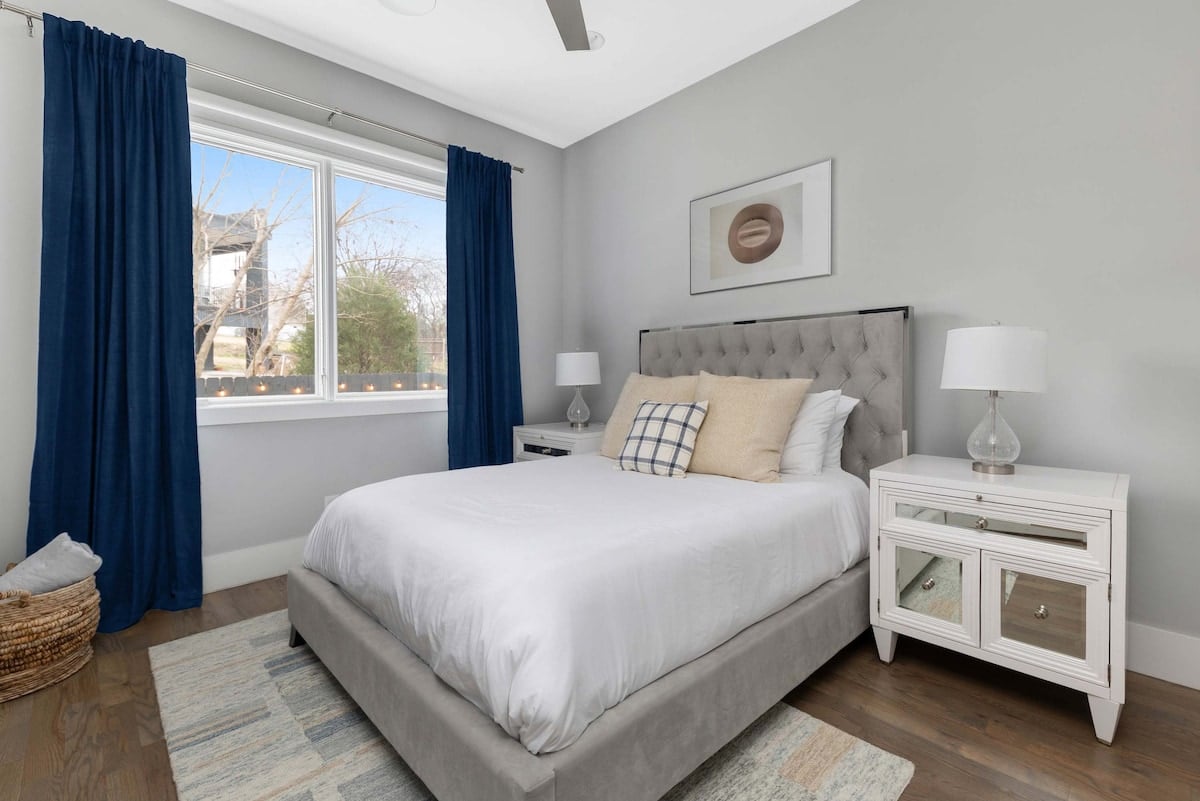 This cozy main floor queen bedroom is the perfect retreat for guests who desire privacy while still being close to the living space.