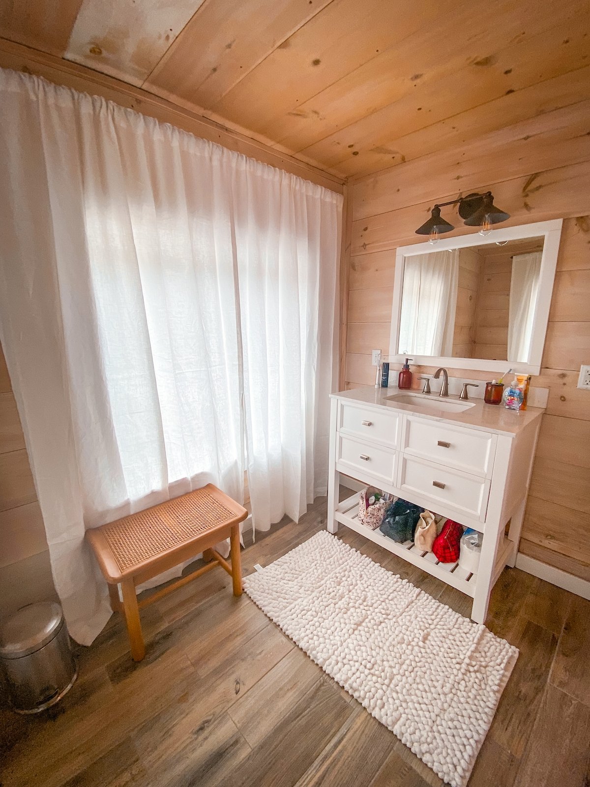 Full bathroom on the second floor is shared by all three rooms.