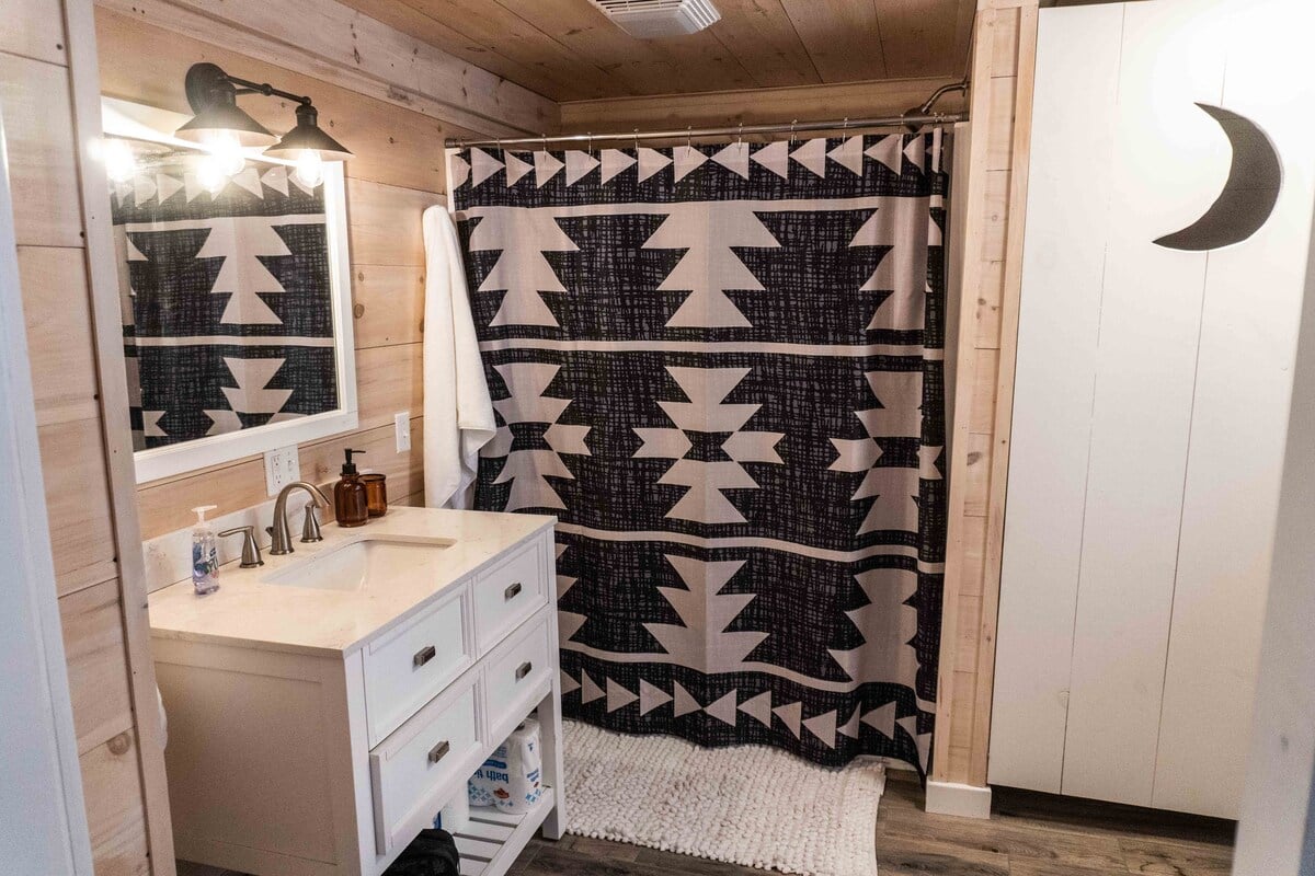 Full bathroom on the first floor includes a shower/tub.