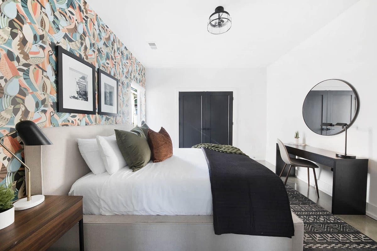 Immaculate Bedroom with Luxury Linens and Cozy Touches