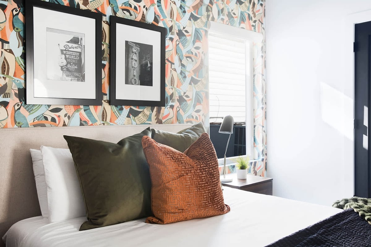 Immaculate Bedroom with Luxury Linens and Cozy Touches