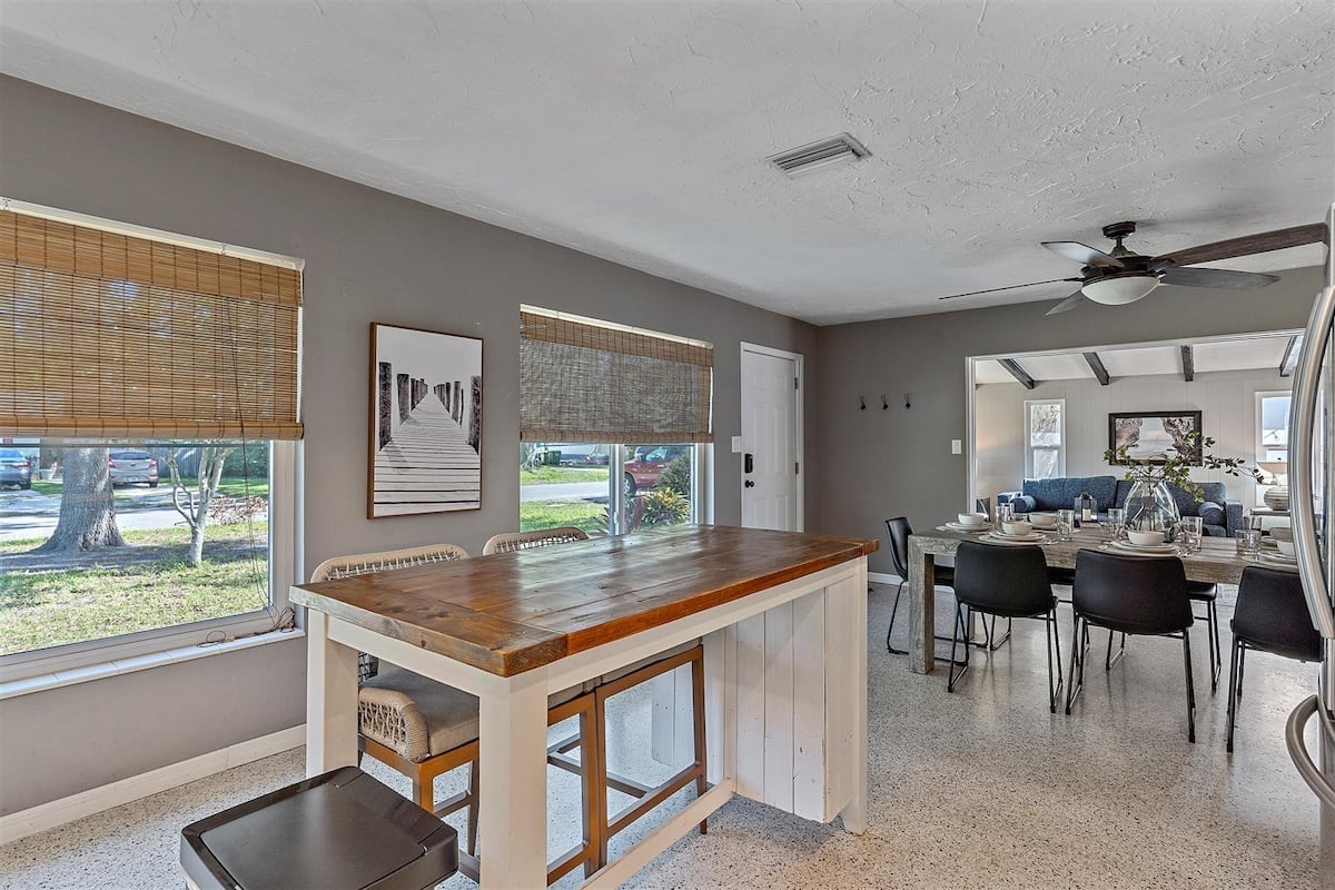 Kitchen view flowing into the dining room.