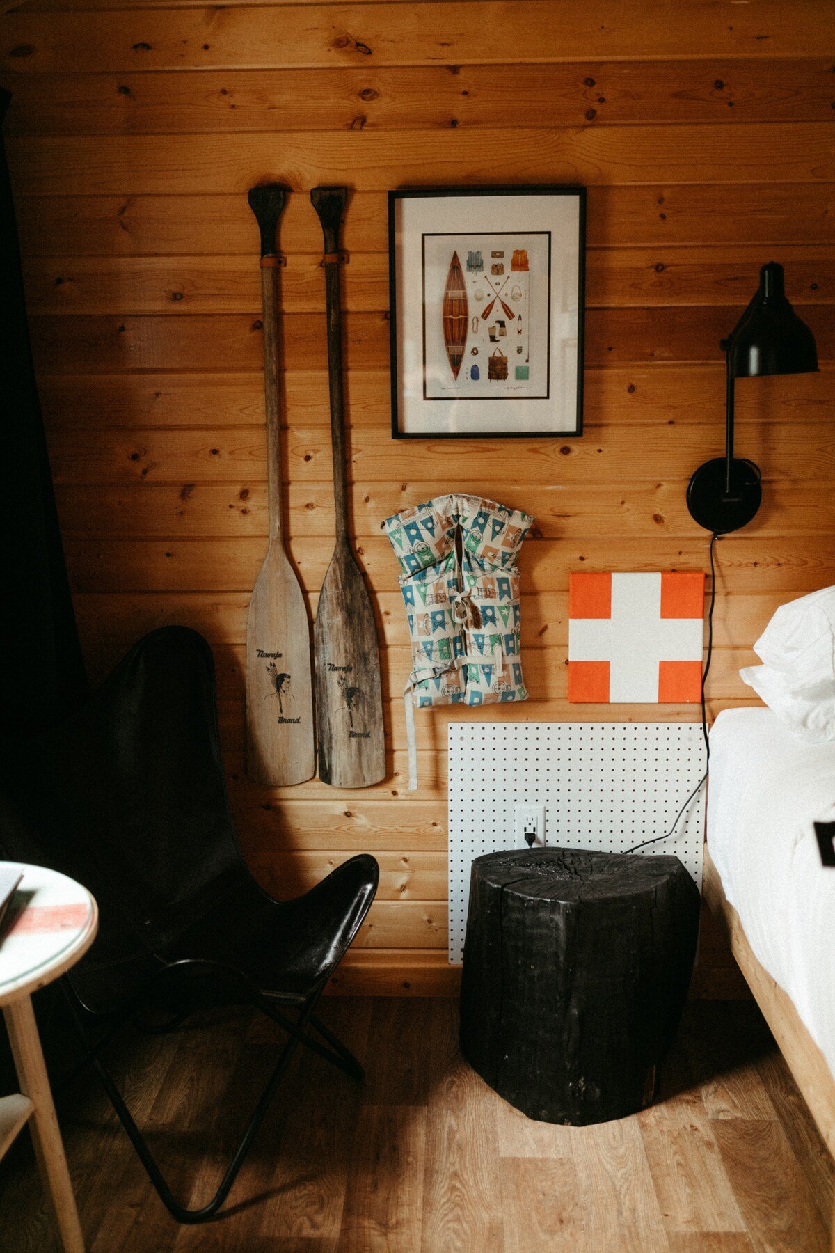 Vintage decor and local artisan artwork plays off the theme of the cabin.
