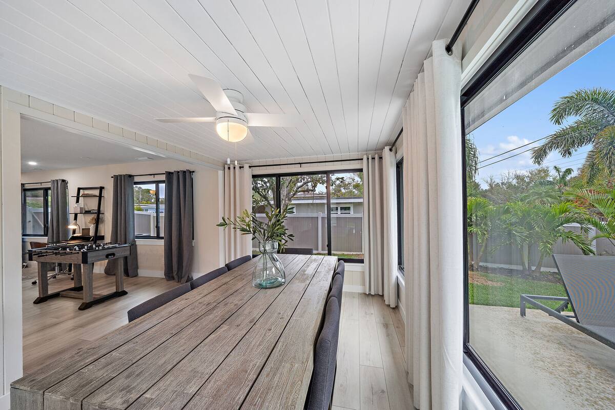 Dining Room space with beautiful large windows lining the room.