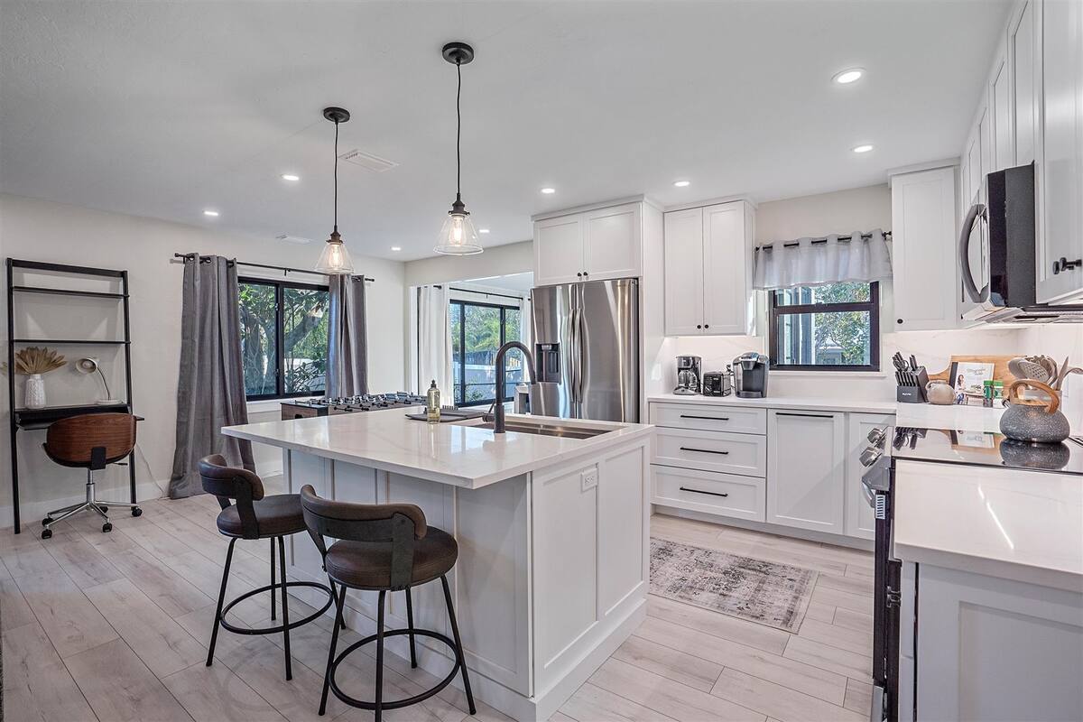 Hang out on the comfy bar stools at the kitchen island.